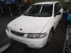 Mazda 323 salvage car from 1998