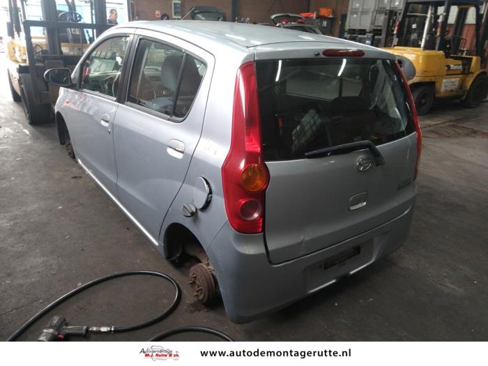 Daihatsu Cuore 1.0 12V DVVT Schrottauto (2009, Grau)